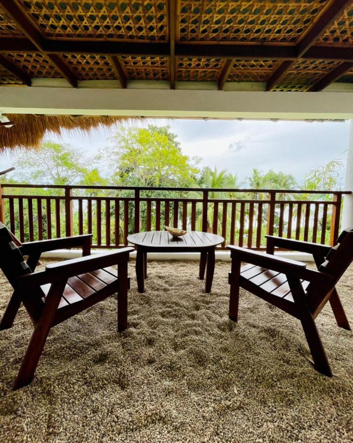 Amun Ini Beach Resort & Spa Anda  Extérieur photo
