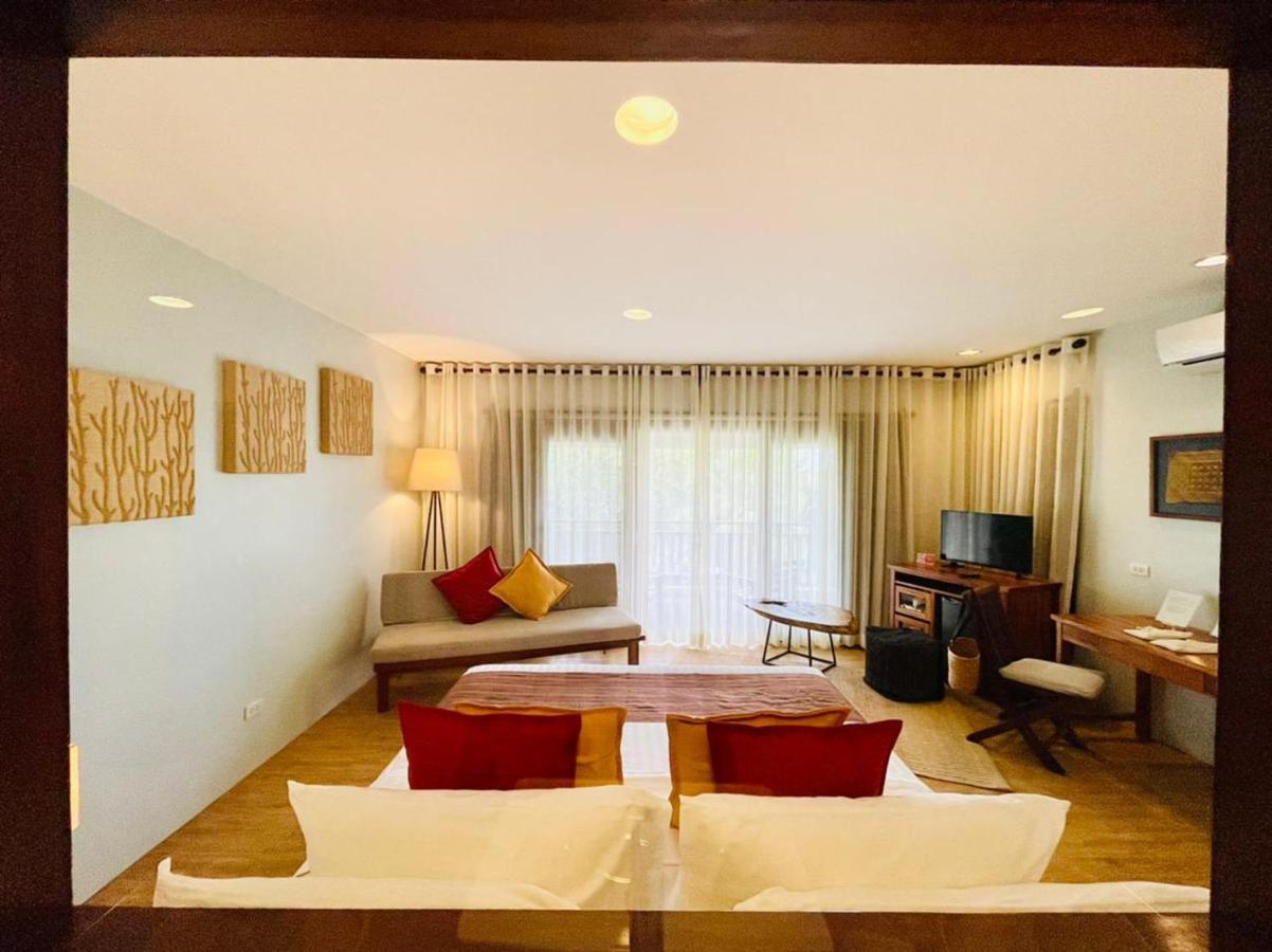 Amun Ini Beach Resort & Spa Anda  Extérieur photo