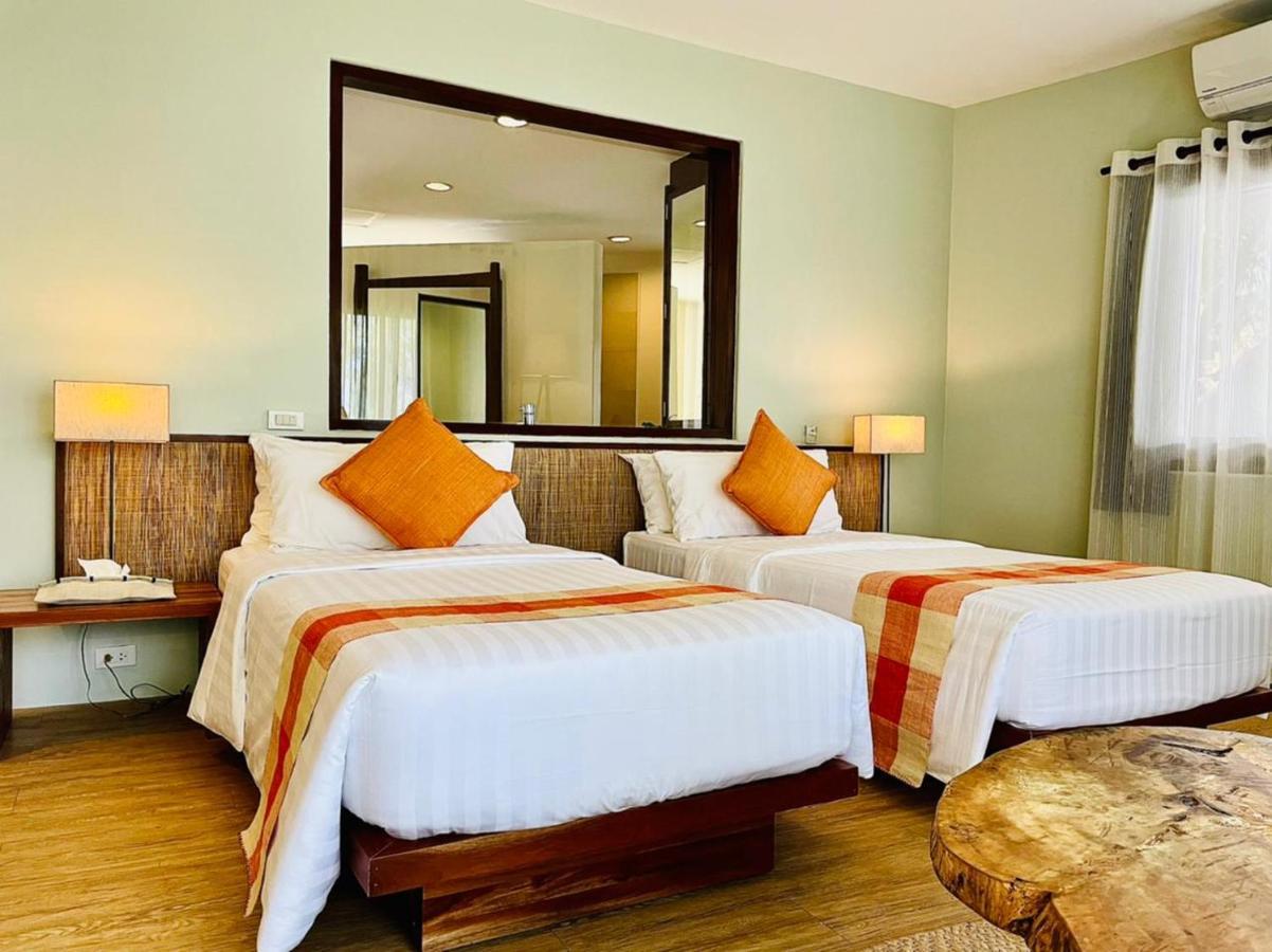 Amun Ini Beach Resort & Spa Anda  Extérieur photo